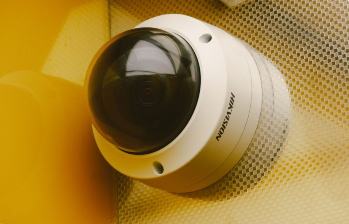 From below of modern camera for recording audio and video in building for security and protection